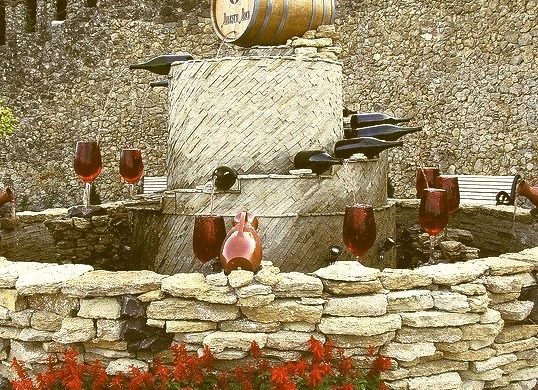 Red wine fountain outside the biggest wine cellars in the world in Milestii Mici, Moldova