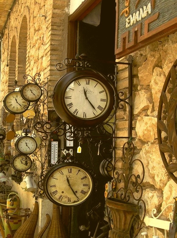 Vintage clocks on the streets of Guadalest, Spain