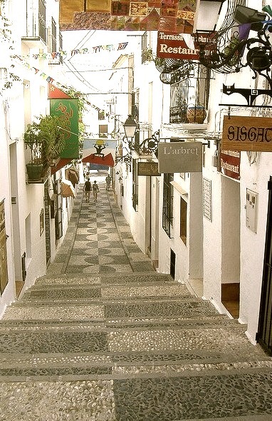 Passageway with restaurants and shops in Altea, Spain